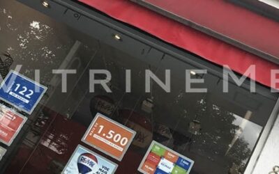 Painéis VitrineMedia instalados em loja RE/MAX Brasil